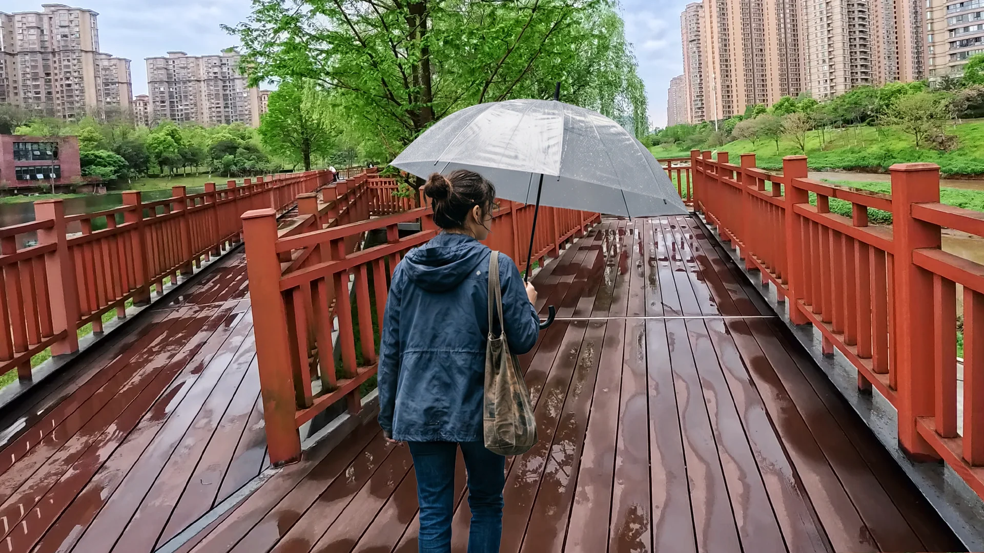 
          A calm daytime walk along the riverside in Changsha after the rain. Experience the peaceful atmosphere of wet streets and natural city sounds in 4K.
        