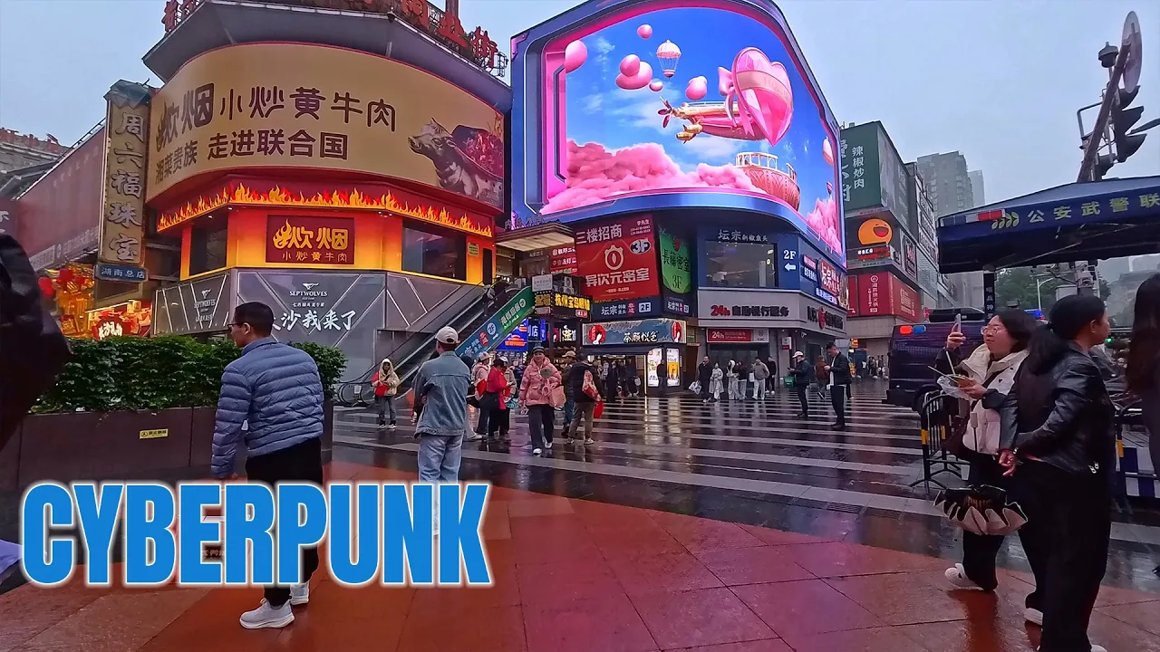 Rain-soaked cyberpunk streets in Changsha, China with neon reflections and giant LED billboards